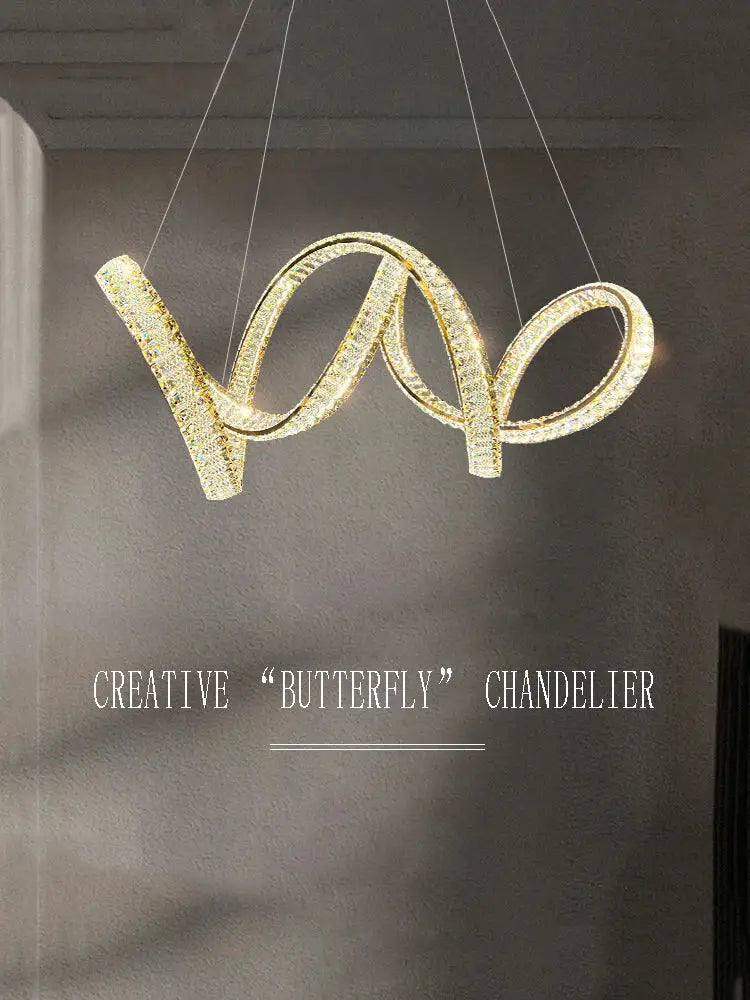 Gold-toned crystal-encrusted butterfly-shaped elegant crystal chandelier with modern swirling design for living room decorbites elegant crystal