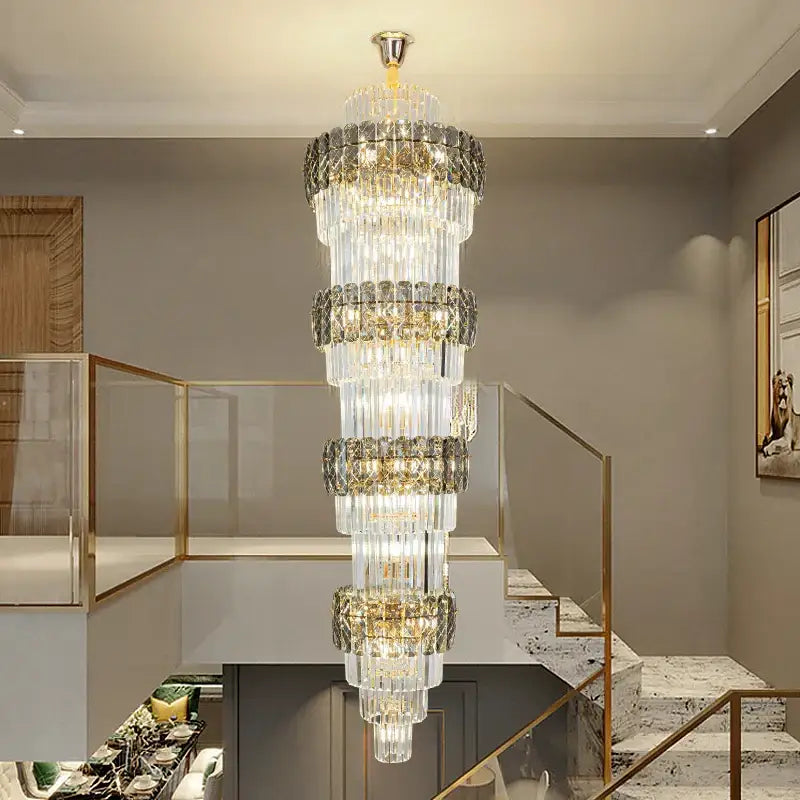 Elegant crystal hollow gold chandelier with cascading clear glass prisms and ornate metallic bands for living room stairwell decorbites elegant crystal