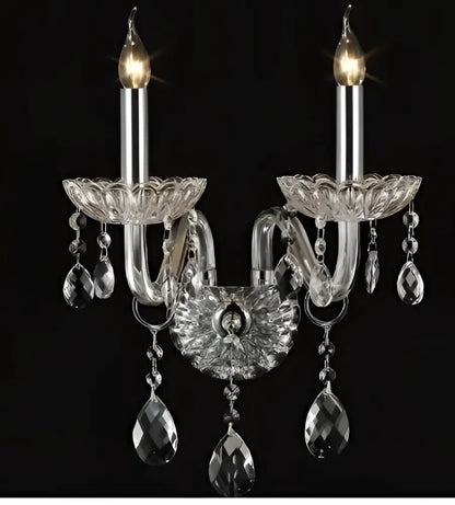 Elegant decorbites crystal lamp wall light with clear glass arms, teardrop crystals, and two candle-style bulbs for bedroom decor