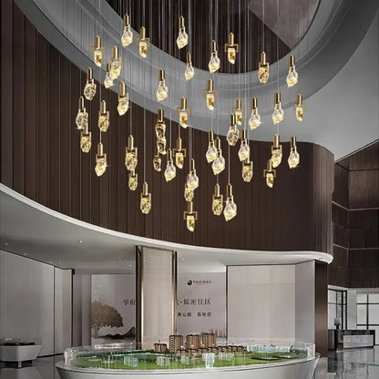 A modern decorbites elegant diamond crystal chandelier with golden irregular crystal pendants for dining room decor
