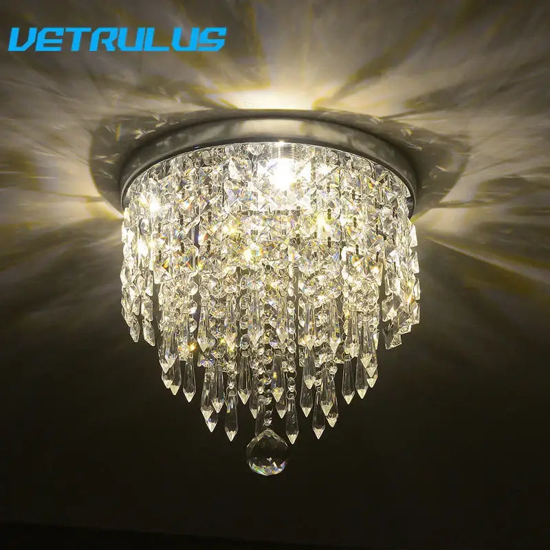 Elegant diamond crystal led ceiling chandelier with clear faceted crystals and sleek chrome base for living room lighting