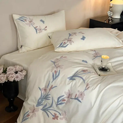 Cream satin bedding set with elegant flower embroidery in pink and blue for refined decorbites elegant flower decor