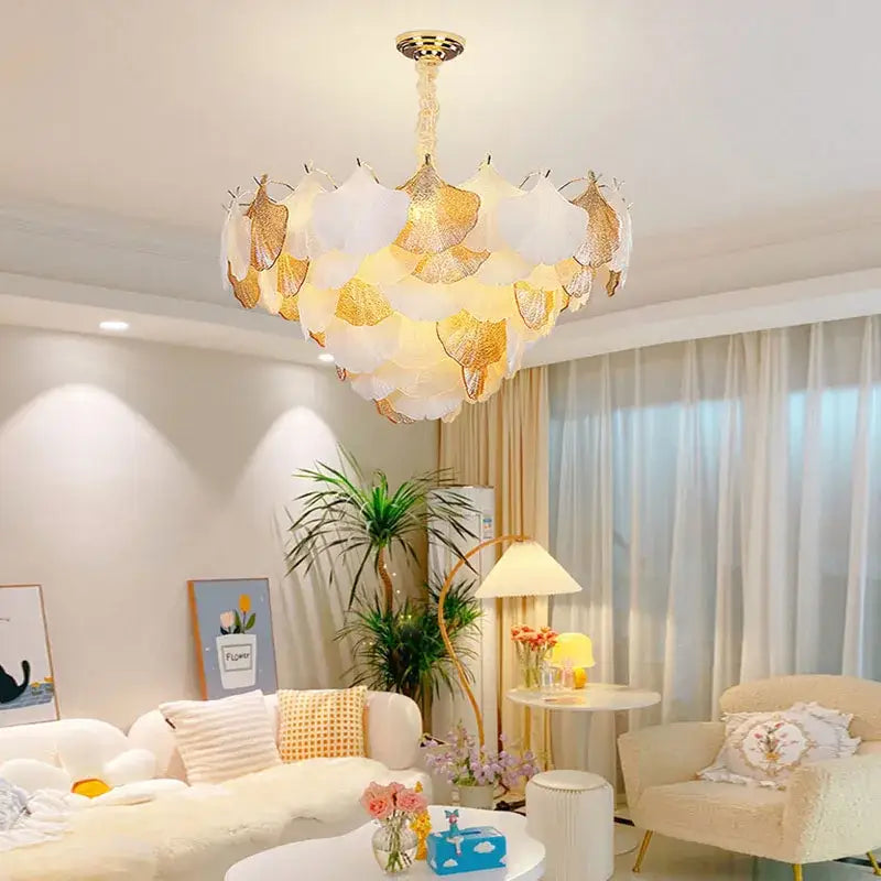 Elegant ginkgo gold led chandelier with layered white and gold leaf-shaped shades for living room decorbites ginkgo gold