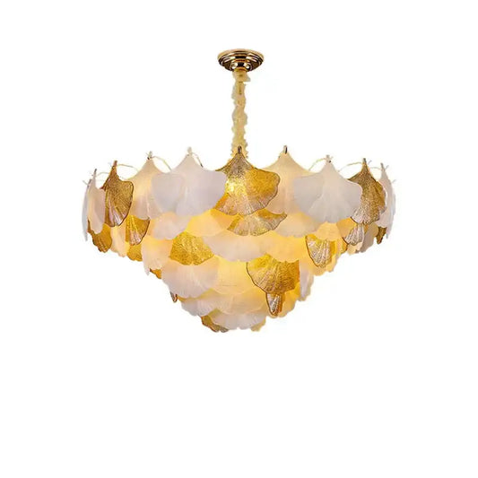 Elegant ginkgo gold led chandelier with layered white and gold-leafed ginkgo leaves on polished brass mount by decorbites