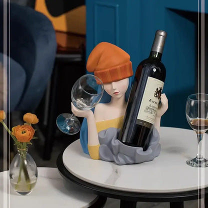 Elegant girl sculpture wine rack featuring an orange beanie figurine holding a wine bottle for dining room decorbites decor