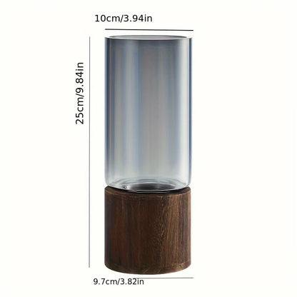 Elegant glass vase with tall translucent gray glass and dark brown wooden base for modern hydroponic plant decor