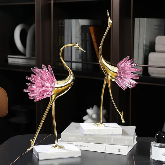 Two elegant gold decorative figurines with pink crystal bird accents on white marble base for living room decorbites crystal bird