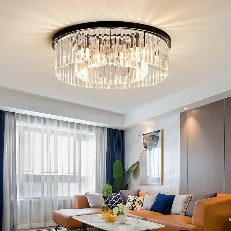 Elegant gold and black decorbites crystal round ceiling chandelier with cascading clear glass prisms for dining room decor