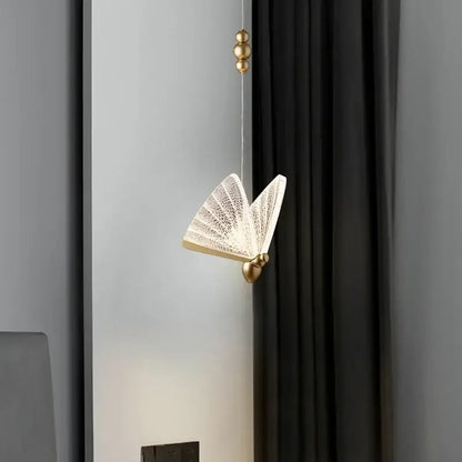 Elegant gold butterfly led pendant light featuring translucent patterned wings and delicate hanging chain for decorbites decorbites butterfly led pendant