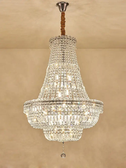 Elegant gold and chrome k9 crystal chandelier with braided rope suspension for dining room decorbites gold chrome design