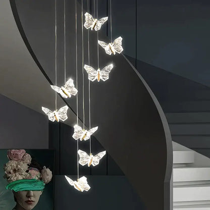 Elegant gold crystal butterfly ladder pendant lights with seven illuminated butterfly-shaped lights for stair decorbites butterfly ladder