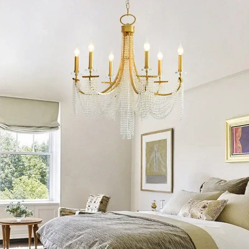 Elegant gold crystal candle chandelier with crystal droplets and candle-style bulbs for dining room decorbites crystal candle