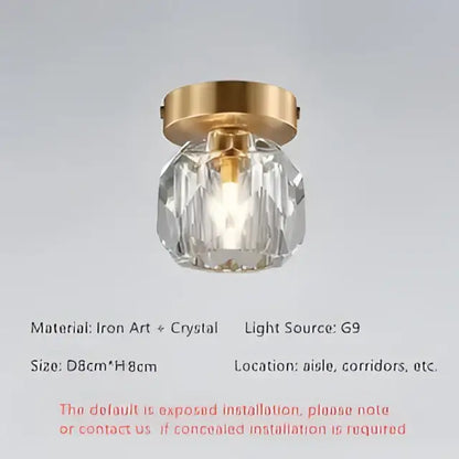 Elegant gold ceiling light fixture featuring a faceted crystal globe and iron art base for hallway entrance