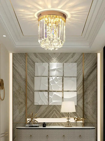 Elegant crystal ceiling light with gold frame and cascading glass prisms for hallway by Decorbites elegant crystal