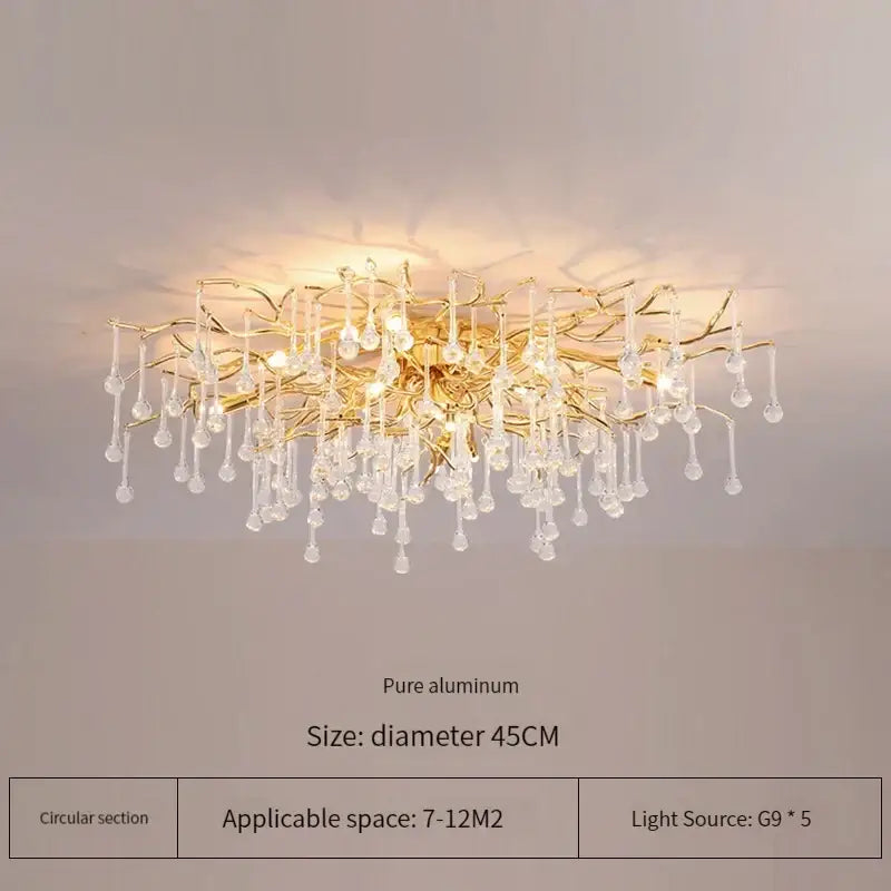 Elegant gold crystal chandelier with intricate branch-like arms and dangling crystal droplets for living room decorbites elegant gold