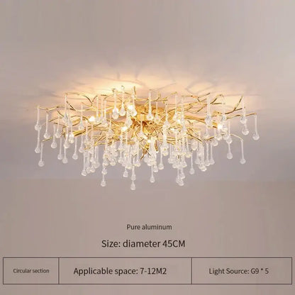 Elegant gold crystal chandelier with intricate branch-like arms and dangling crystal droplets for living room decorbites elegant gold