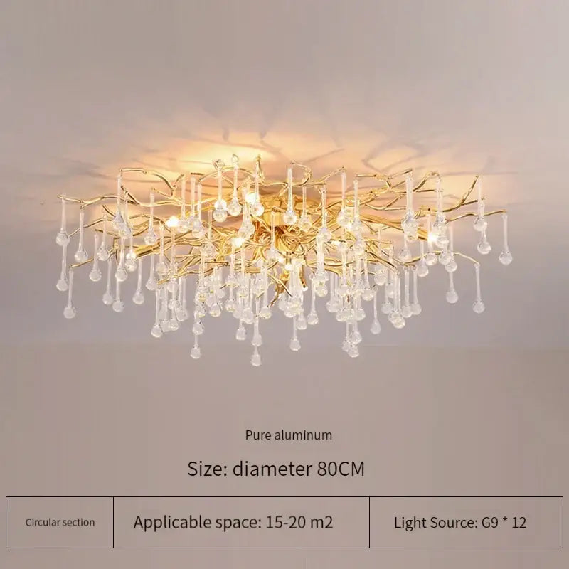 Elegant gold crystal chandelier with branching tree design and clear crystal droplets perfect for living room decorbites elegant gold