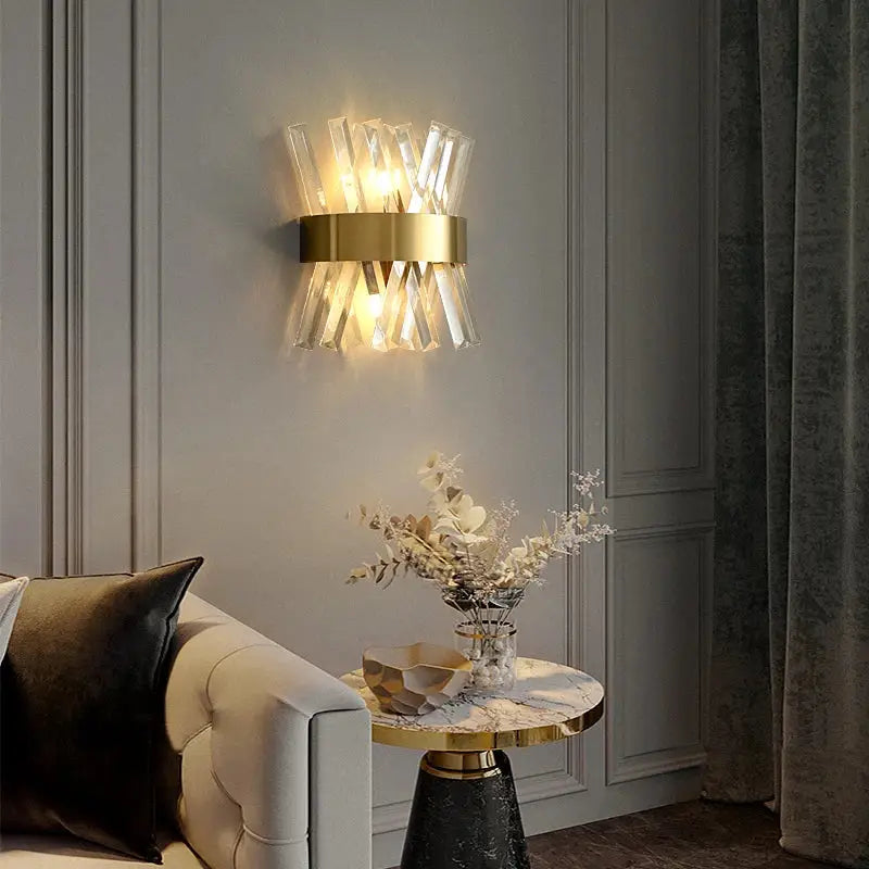 Elegant gold crystal led wall lamps bedroom sconce decor with gold-toned base and clear faceted crystal rods radiating outward