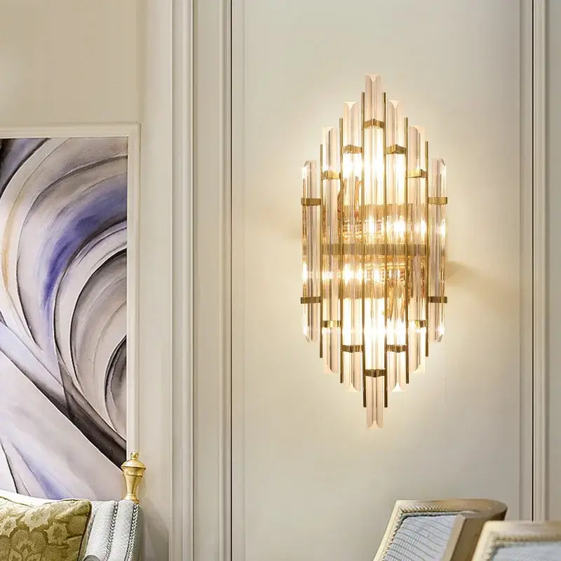 Elegant gold crystal wall lamp featuring vertical glass rods and metallic accents for living room wall decoration