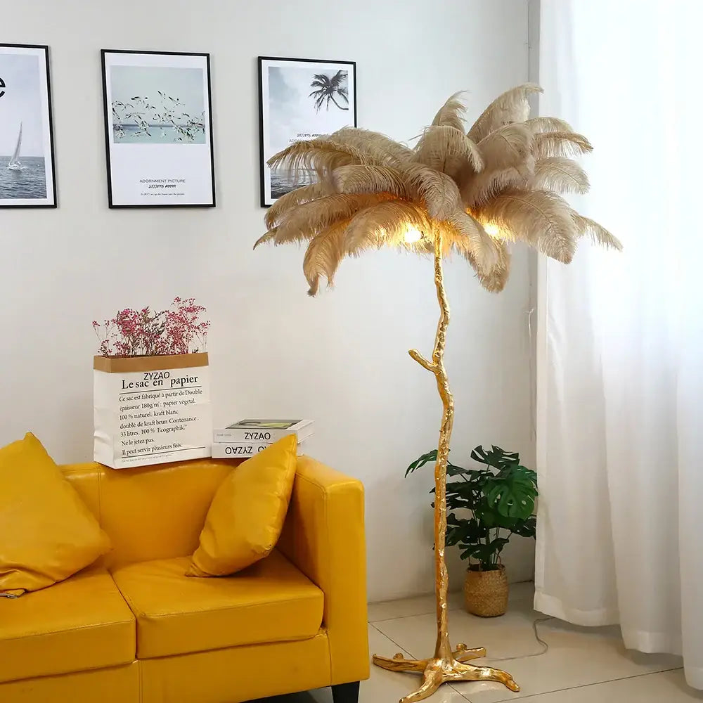 Golden feathered palm tree floor lamp with elegant ostrich feather design and warm glow for decorbites elegant ostrich decor
