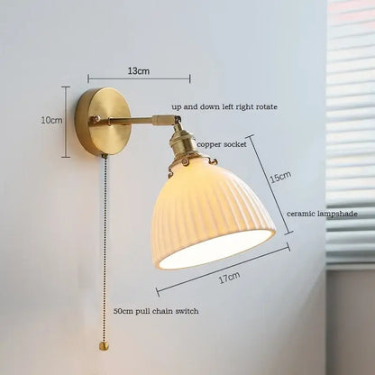 Brass-finished wall light with ribbed cream ceramic led shade copper socket adjustable arm and pull-chain decorbites ceramic led wall