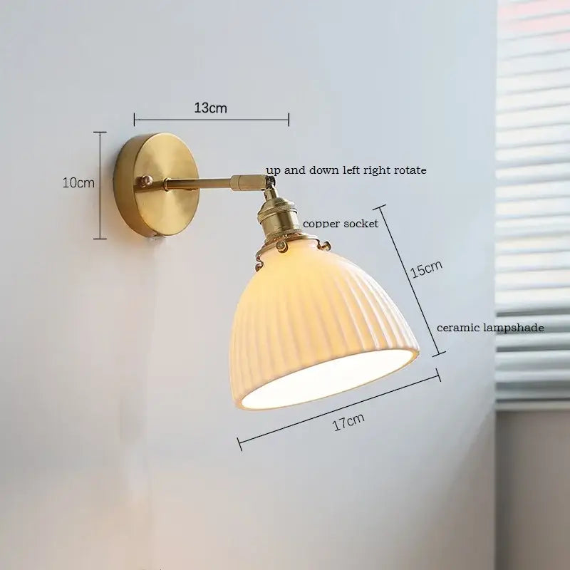 Elegant gold ruffled ceramic led wall light with brass-finished copper socket and ribbed off-white ceramic lampshade decorbites ceramic led wall