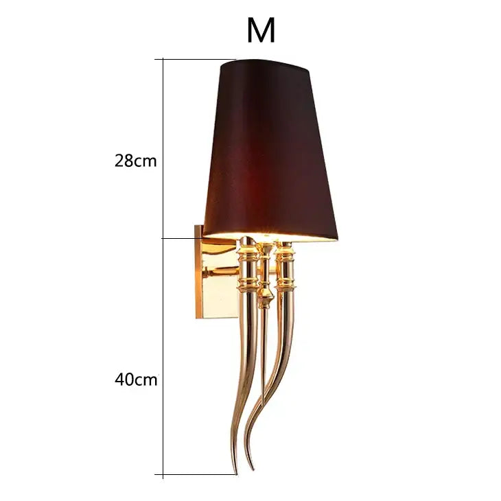 Elegant gold and silver iron claw horn wall sconce with dark brown fabric shade and curved metallic arms for bedroom use