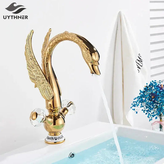 Elegant gold swan basin faucet by uythner with intricate wing detailing and crystal knobs for bathroom decorbites gold swan