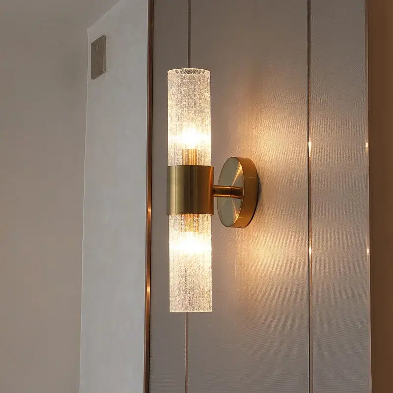 Elegant gold textured glass wall lamp with brushed brass hardware for bedroom warm lighting decorbites elegant crystal led