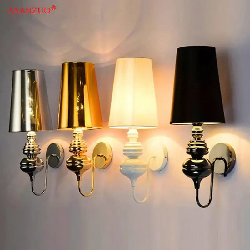Set of four elegant decorbites guards wall lamps in silver gold and black with matching metallic shades for bedroom use