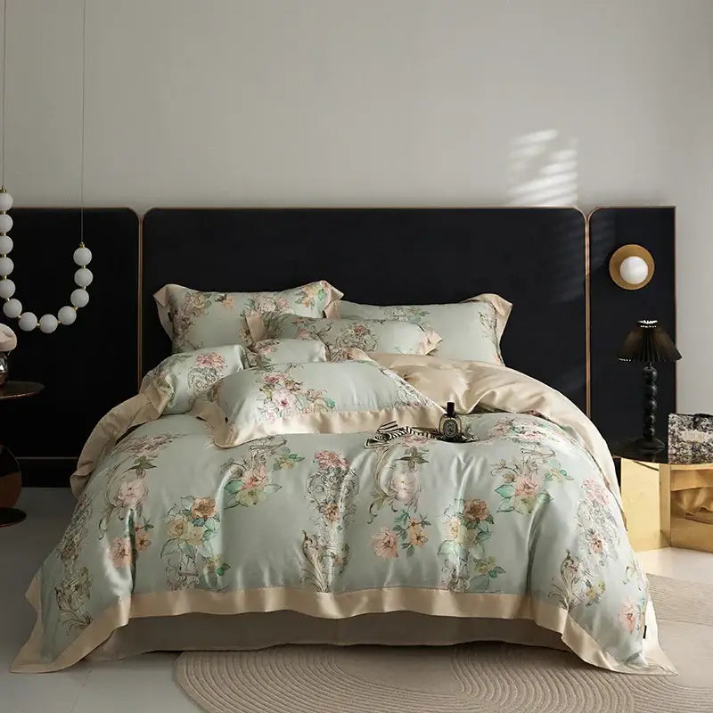 Elegant mint green satin bedding set with delicate floral embroidery and cream piping decorbites eucalyptus fiber