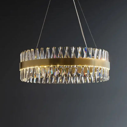 Elegant oval brushed gold rings crystal chandelier with a gold-toned frame and cascading clear prisms for dining room decorbites brushed gold
