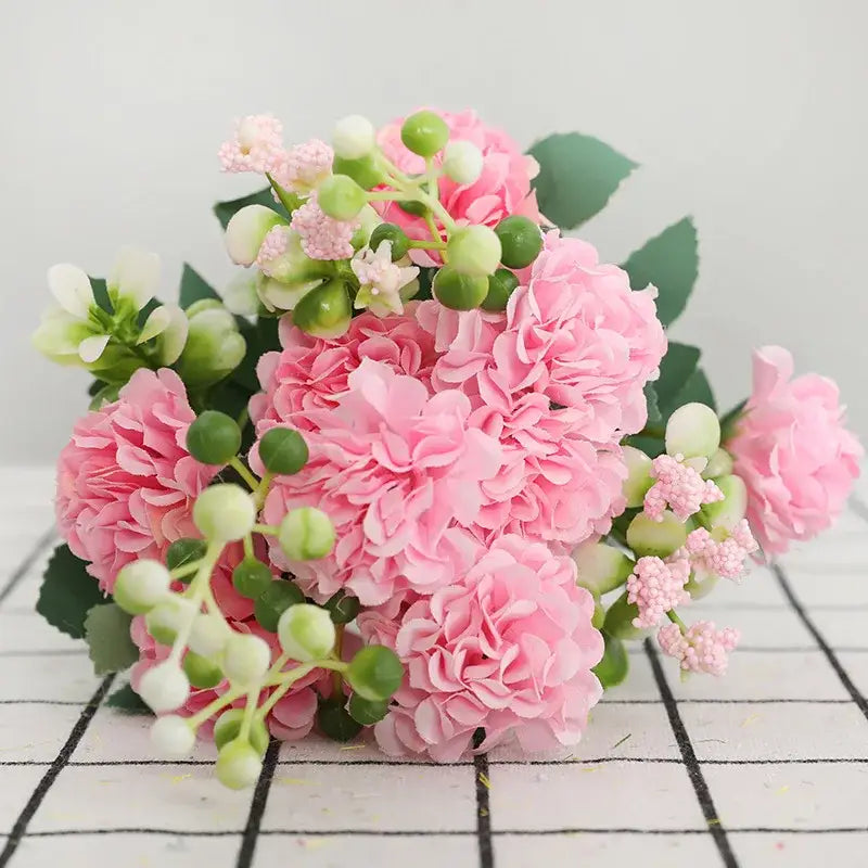 Elegant pink decorbites daisy bouquet of artificial hydrangeas with green leaves and white berries for living room decor