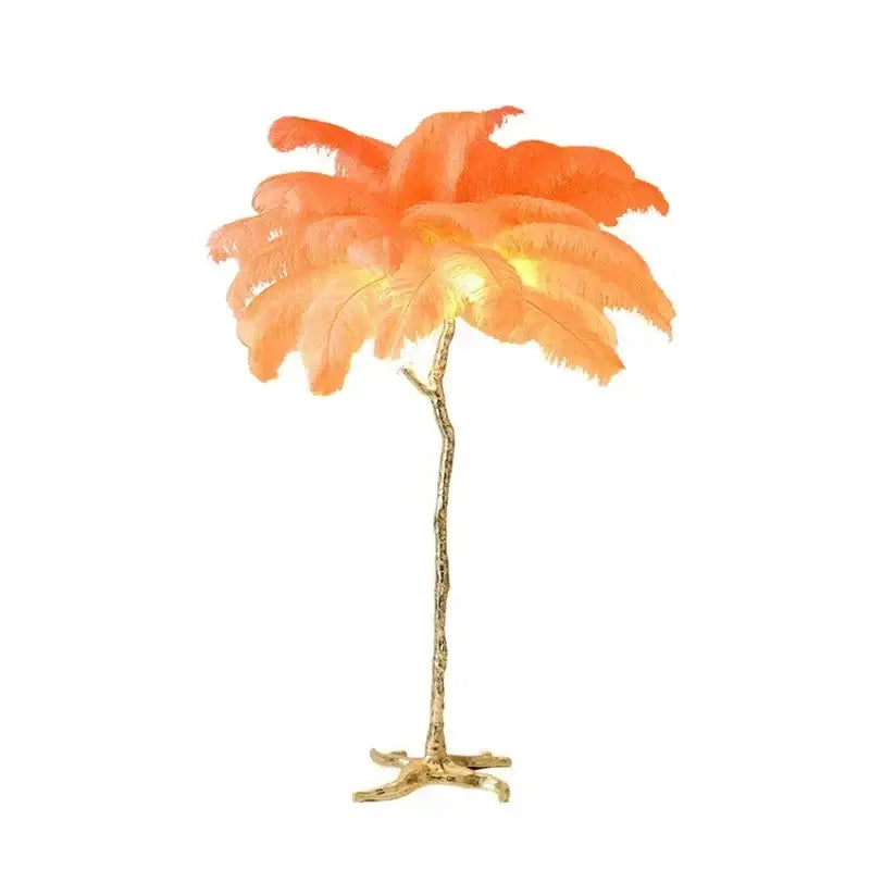 Elegant pink ostrich feather floor lamp with orangish-orange shade and gold branch stand from decorbites elegant feather collection