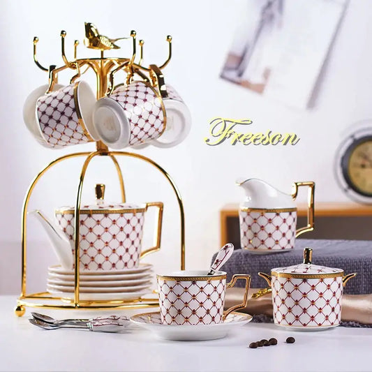 Elegant red and gold porcelain coffee set with white porcelain teacup featuring decorbites gold porcelain trim and lattice pattern