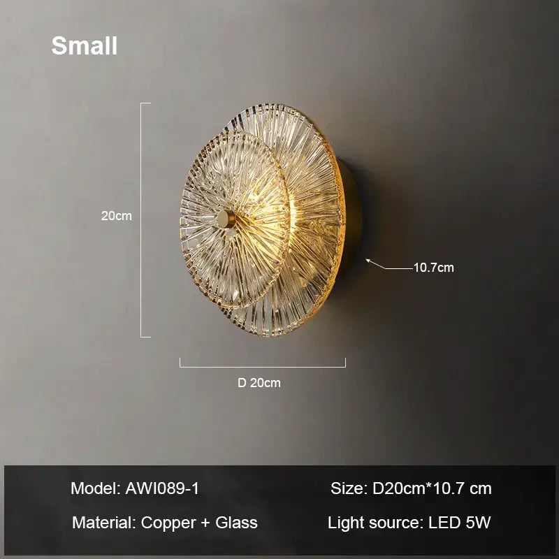 Gold-toned wall sconce with layered radiating glass panels and copper base decorbites elegant glass wall fixture