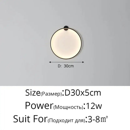Circular minimalist wall sconces with sleek black frame and soft diffused glow for decorbites elegant round wall lighting