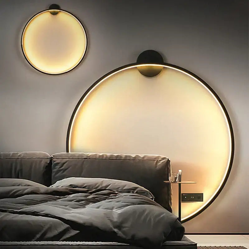 Modern decorbites elegant round wall sconces with warm glowing light and sleek black frames for indoor bedroom lighting