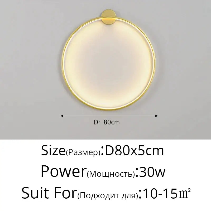 Gold-toned circular wall sconce with sleek modern design and soft diffused light for bedroom decorbites elegant round wall lighting
