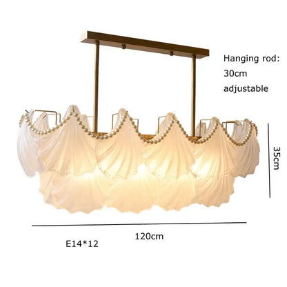 Elegant gold metal pearl chain chandelier with flowing white fabric shades and beaded trim for dining room decorbites crystal pearl lighting