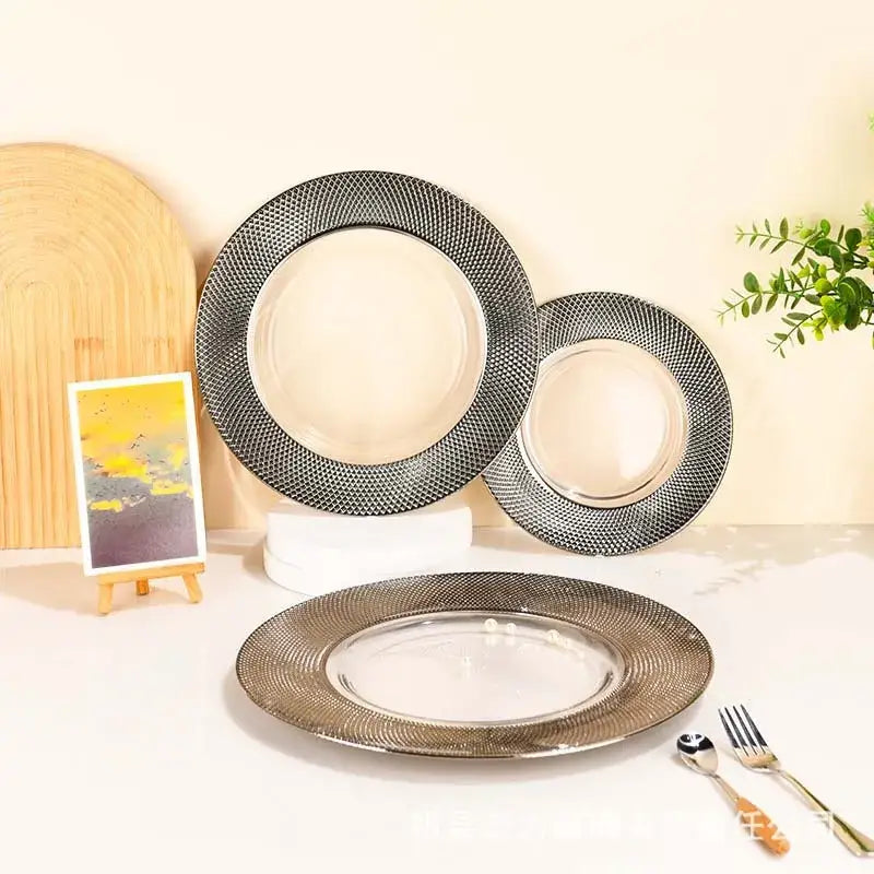 Set of three elegant glass steak and pasta plates with textured metallic silver rim for enhanced dining experience