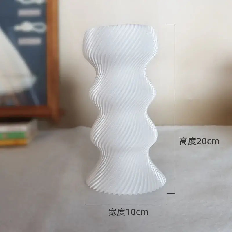 A decorbites elegant white ceramic vase with modern wavy ribbed design 20cm high ideal for living room decorbites elegant high-end decor