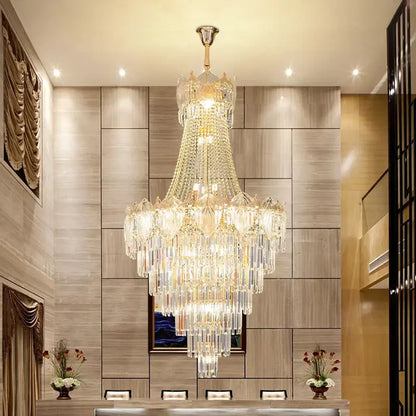 Elegant simple staircase chandelier featuring multi-tiered gold crystal prisms on a polished brass fixture for living room decorbites elegant simple design