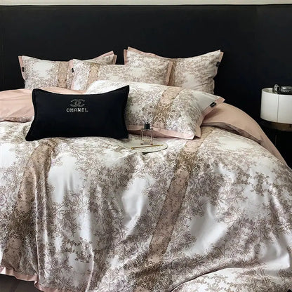 Elegant teal and gold floral luxury bedding set featuring a satin duvet cover and matching pillow shams in beige cream tones