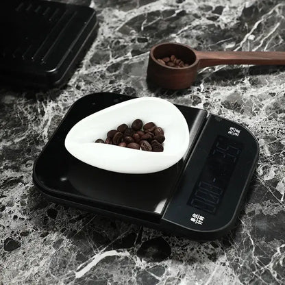 Black digital kitchen scale with white ceramic bowl from decorbites ceramic white dose trays and tea spoon set