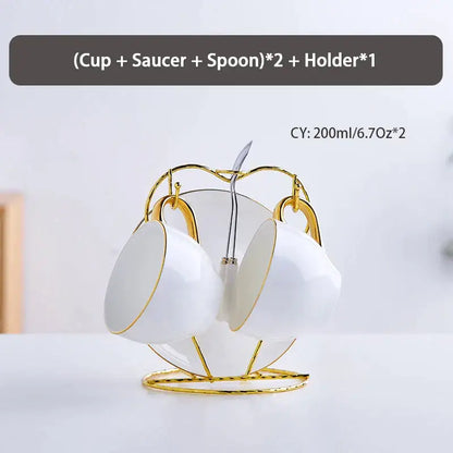 Elegant white and gold bone china tea set with cups saucers and spoons on gold metal holder by decorbites elegant bone