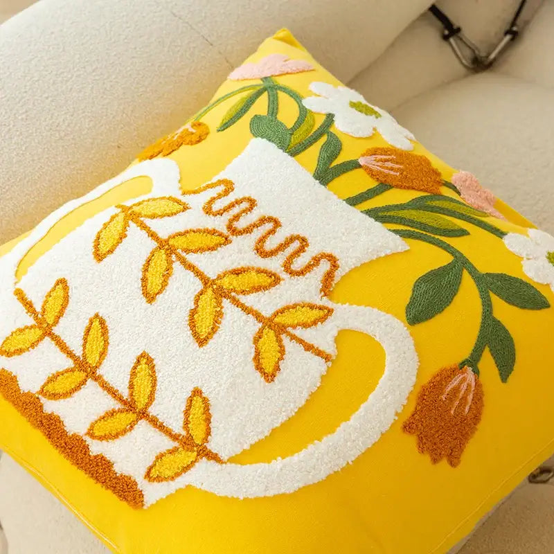 Elegant yellow cushion cover with embroidered white vase flower and golden leaves decorbites elegant yellow decor