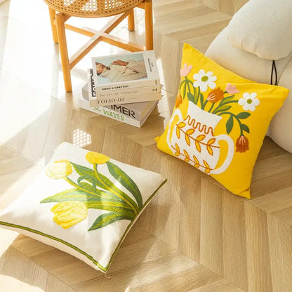 Elegant yellow vase flower cushion cover with embroidered floral design and white pitcher for living room decorbites decor