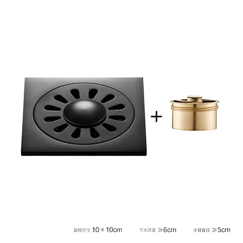 Black brass square floor drain with embossed floral sunburst pattern and gold decorbites brass square overflow cover for shower room