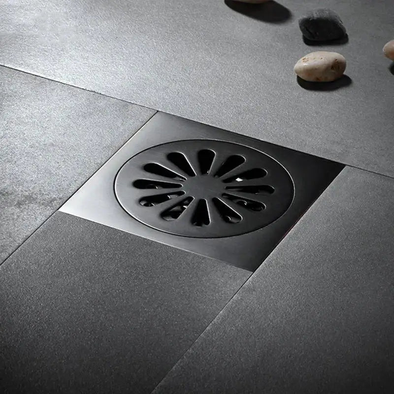 Embossed floral black brass square floor drain with sunburst grille design for shower room decorbites brass square